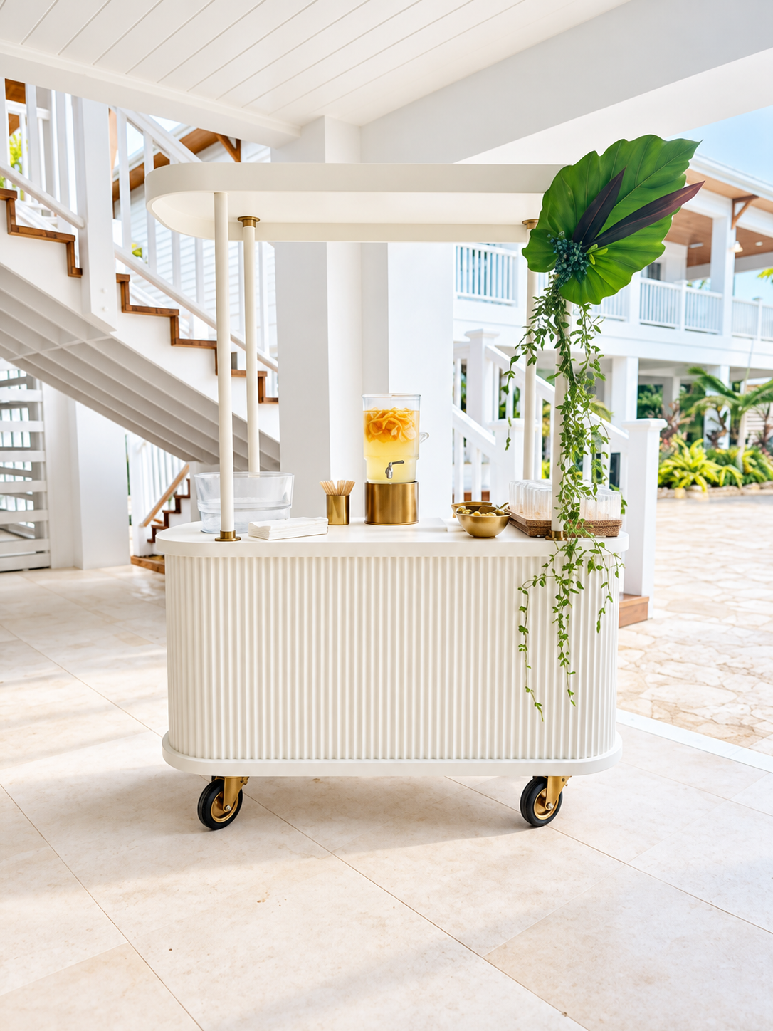 White Cart Haus beverage cart with citrus water at the A Joy Catering Wellness Retreat