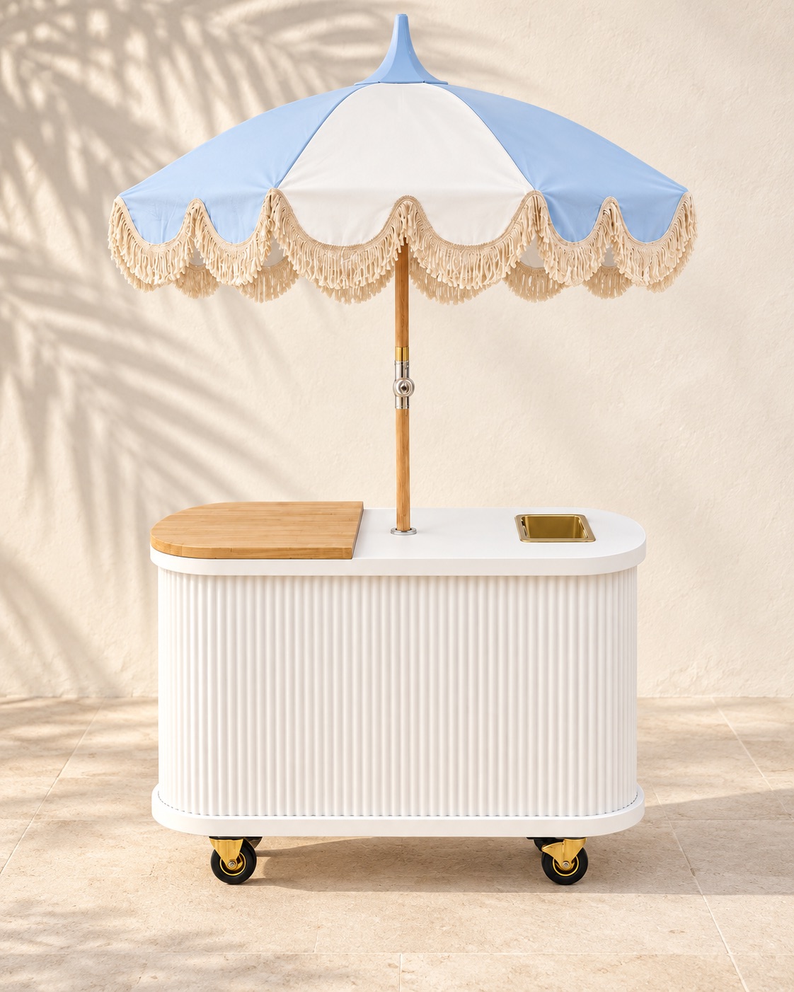 White Cart Haus coconut experience cart with a light blue umbrella